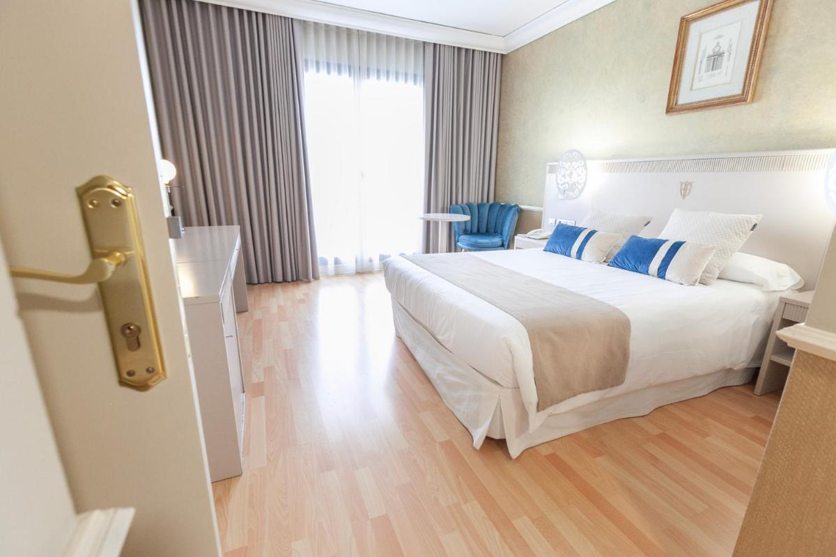 Cama o camas de una habitación en Hotel Alfonso VIII