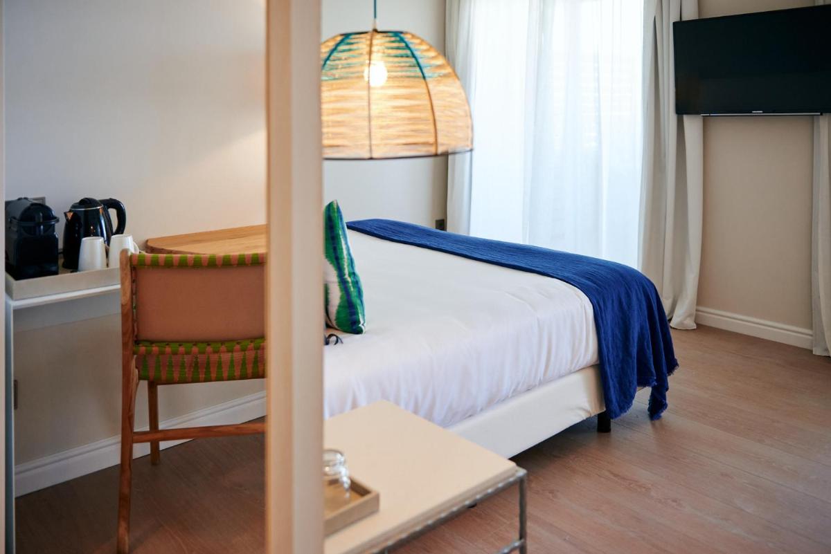 Cama o camas de una habitación en Hotel Honucai