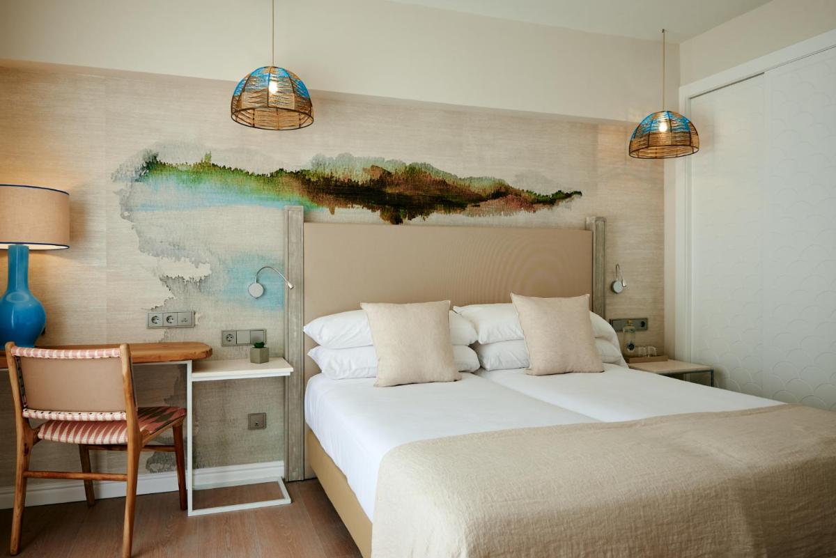 Cama o camas de una habitación en Hotel Honucai