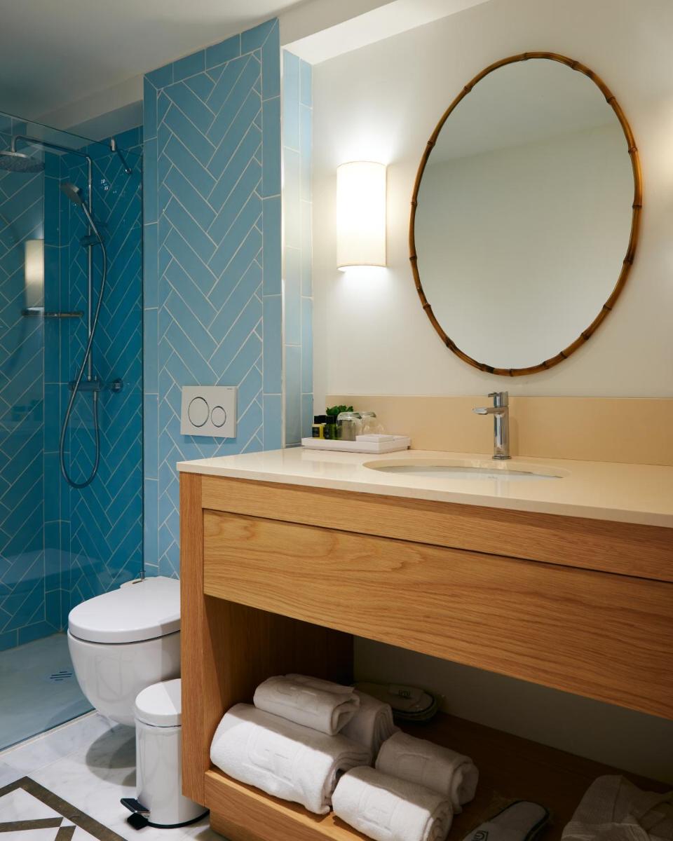 Un baño de Hotel Honucai