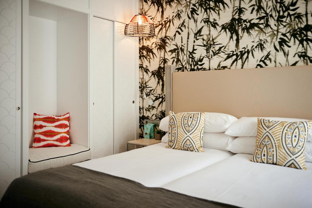 Cama o camas de una habitación en Hotel Honucai