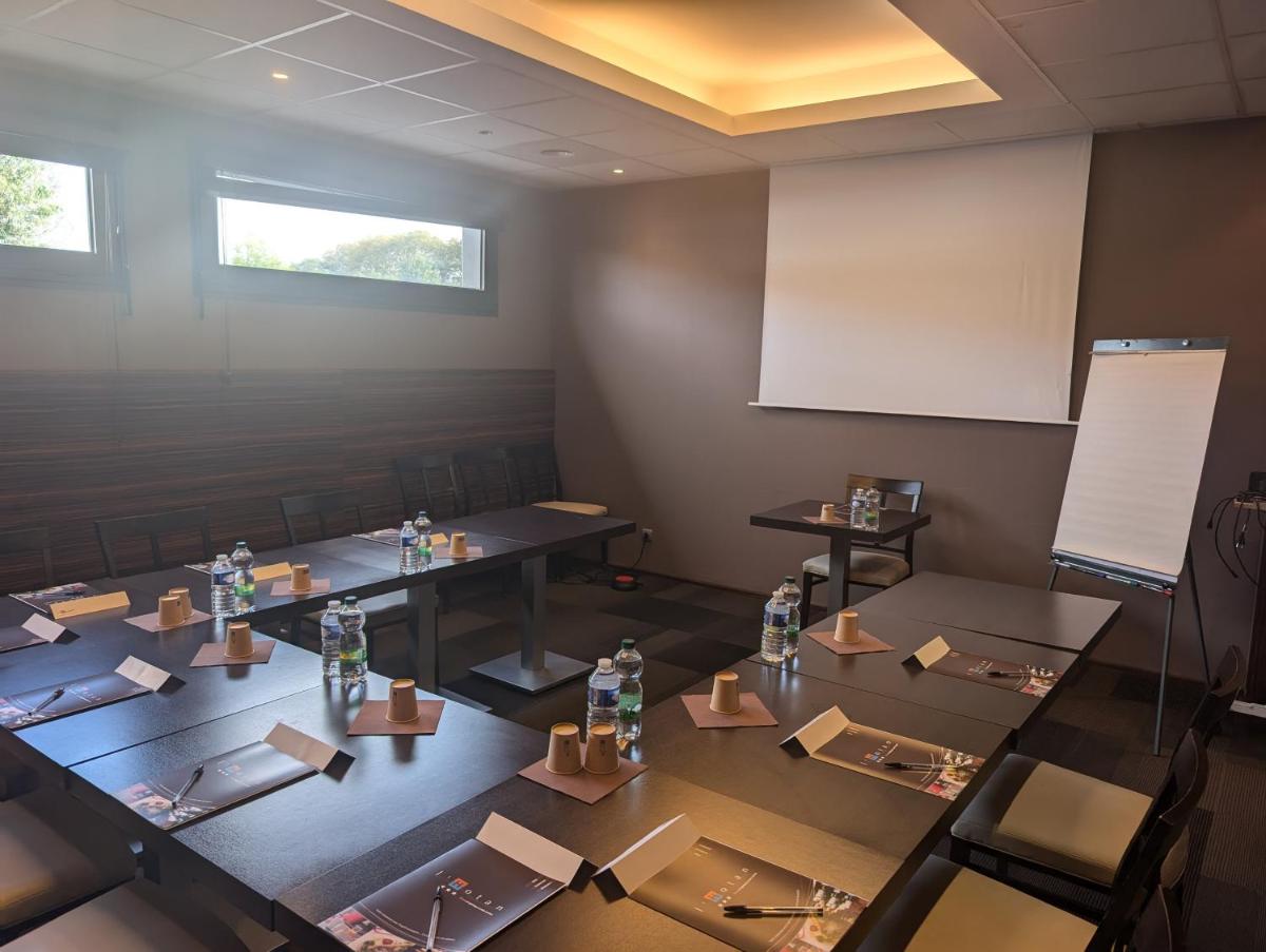 Espace de conférence ou salle de réunion dans l'établissement Hotel L'Hotan