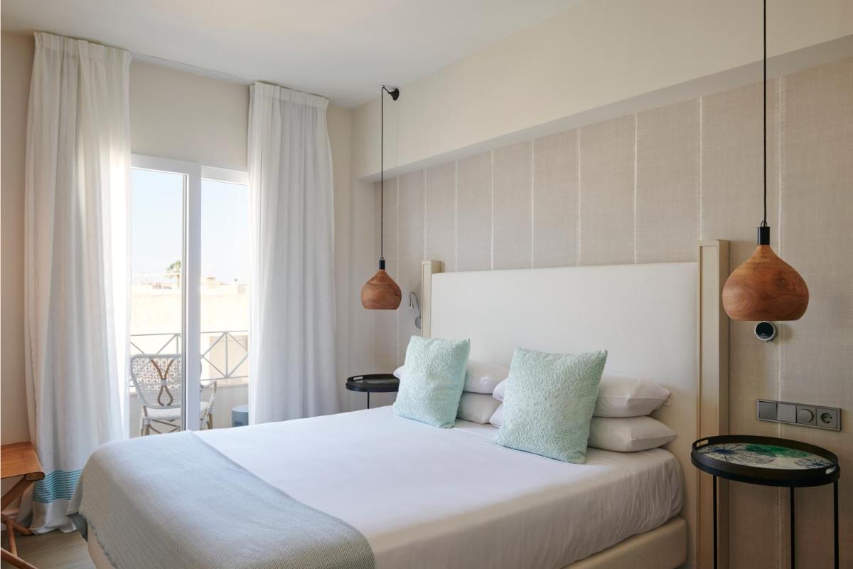 Cama o camas de una habitación en Hotel Honucai