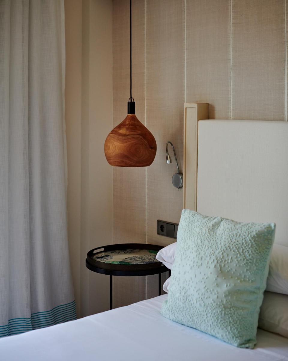 Cama o camas de una habitación en Hotel Honucai