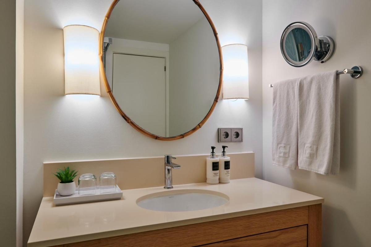Un baño de Hotel Honucai