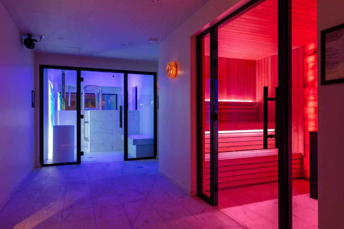 Un ou plusieurs lits dans un hébergement de l'établissement Ki Space Hotel & Spa - near Disneyland Paris