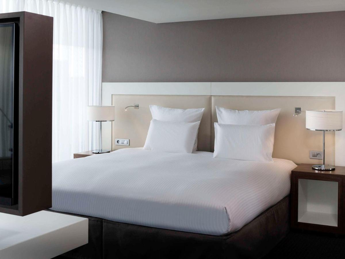 Un ou plusieurs lits dans un hébergement de l'établissement Pullman Paris Centre - Bercy