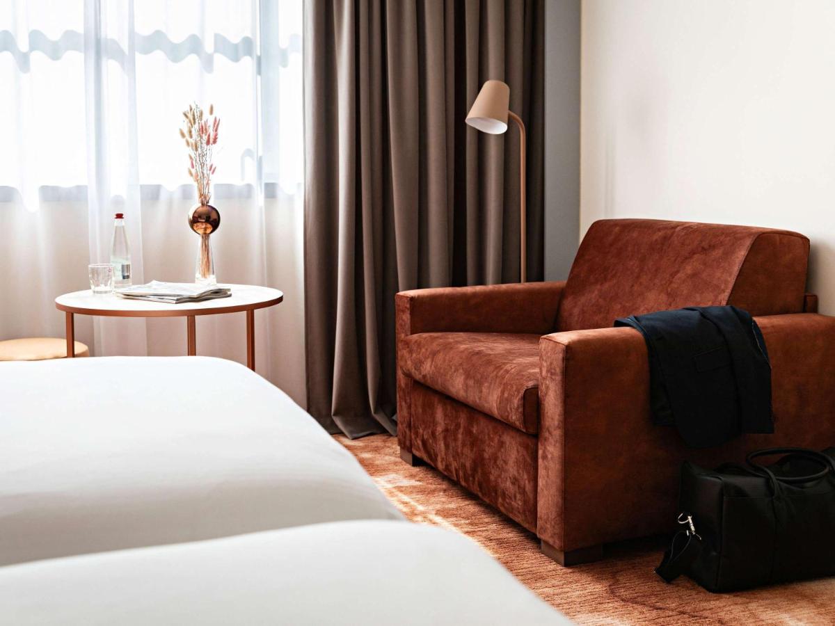 Un ou plusieurs lits dans un hébergement de l'établissement Pullman Paris Centre - Bercy
