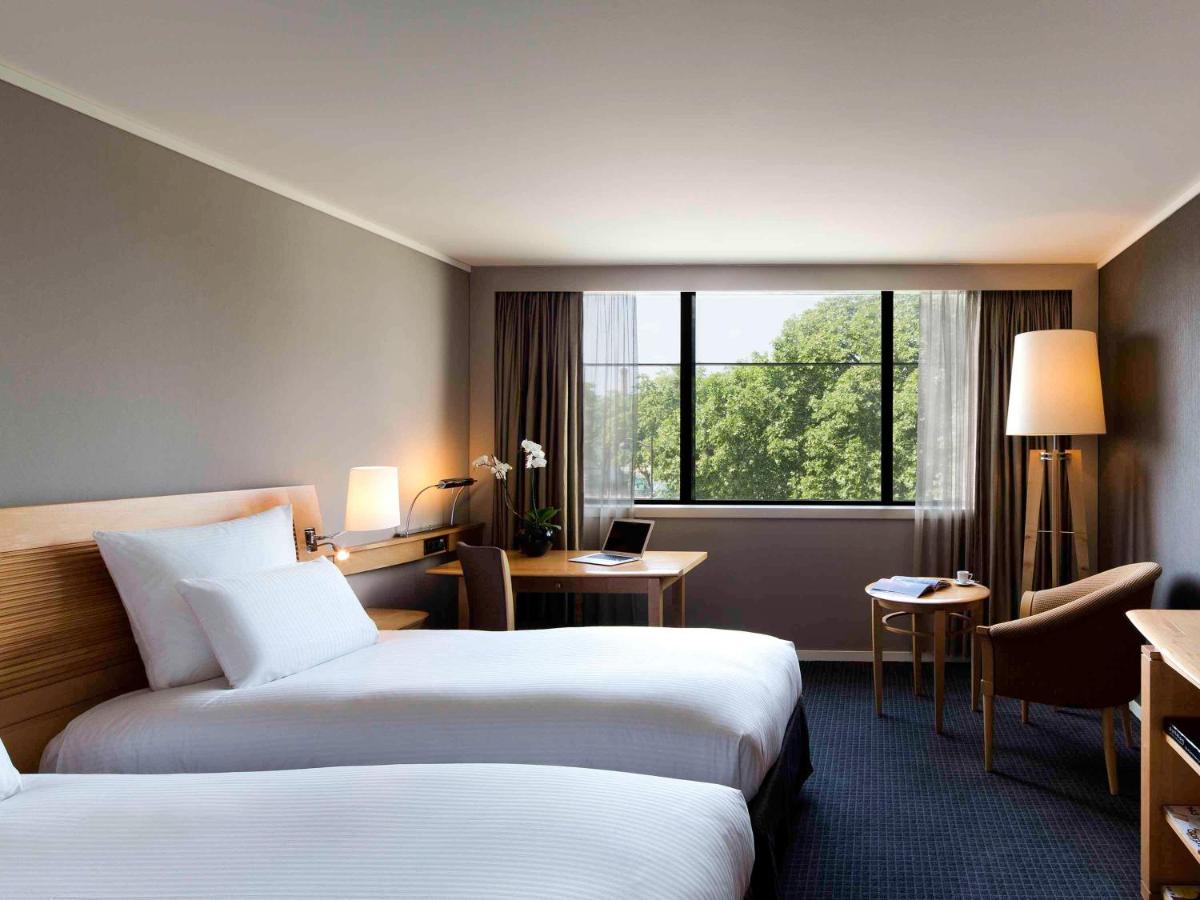 Un ou plusieurs lits dans un hébergement de l'établissement Pullman Paris Centre - Bercy