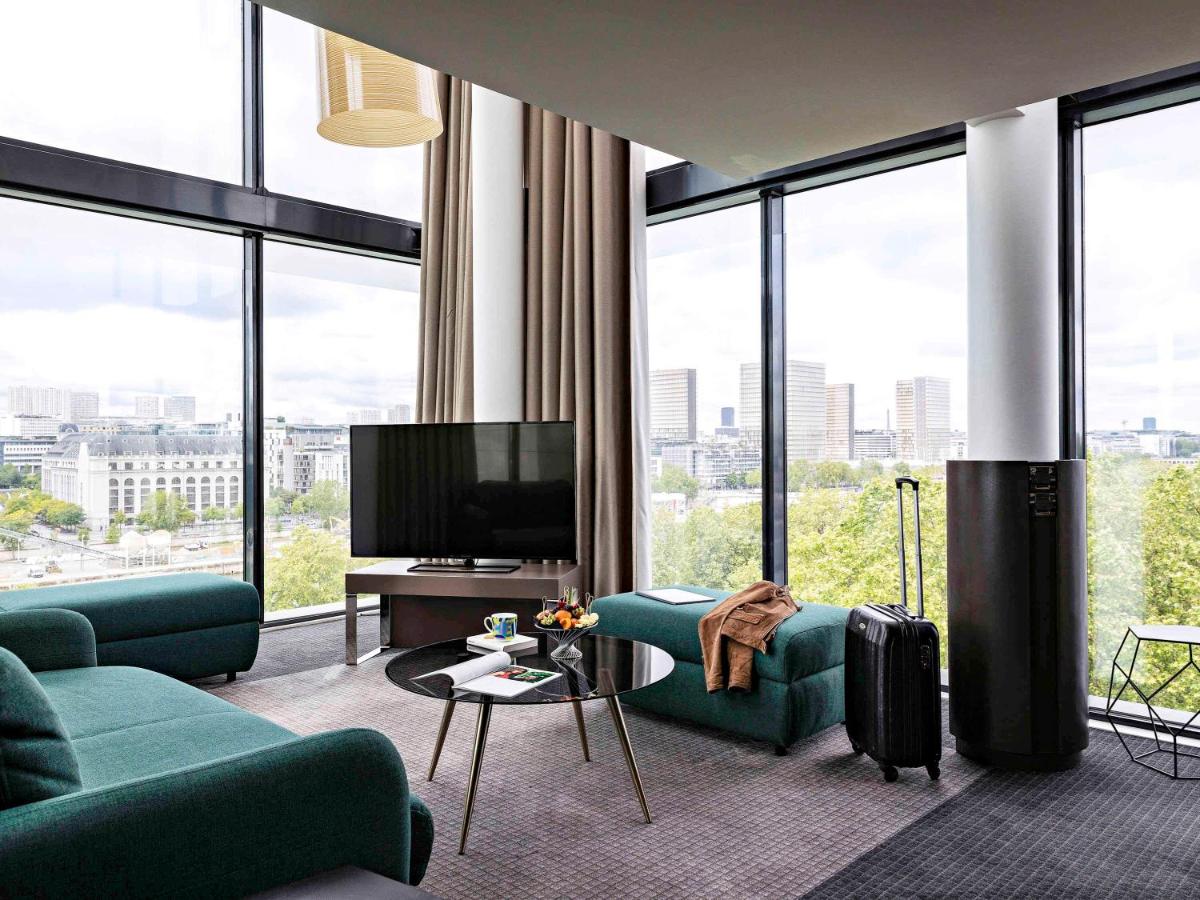 Télévision ou salle de divertissement dans l'établissement Pullman Paris Centre - Bercy