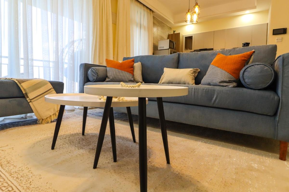 mordern living apartment with heated swimming pool fully equipped gym ample parking space and children playing ground and a relaxing rooftop with breathtaking scenic views - Housity