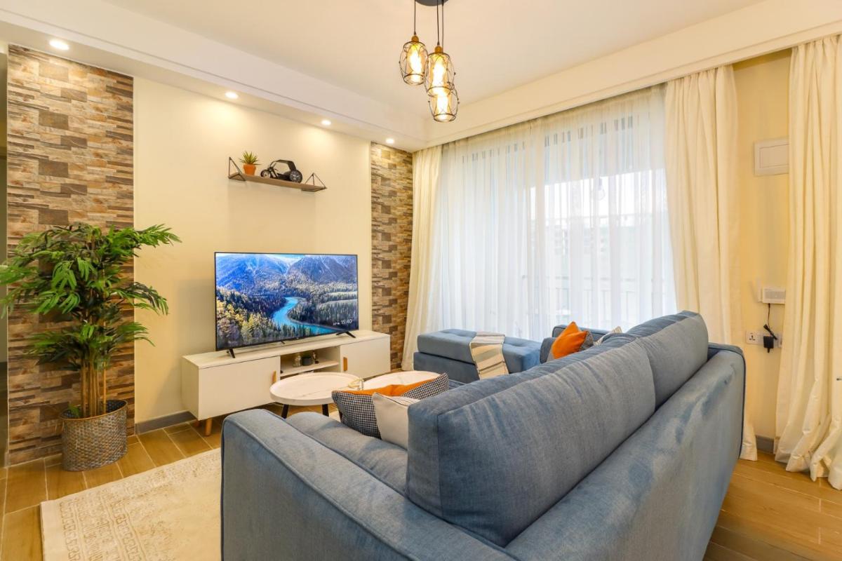 mordern living apartment with heated swimming pool fully equipped gym ample parking space and children playing ground and a relaxing rooftop with breathtaking scenic views - Housity