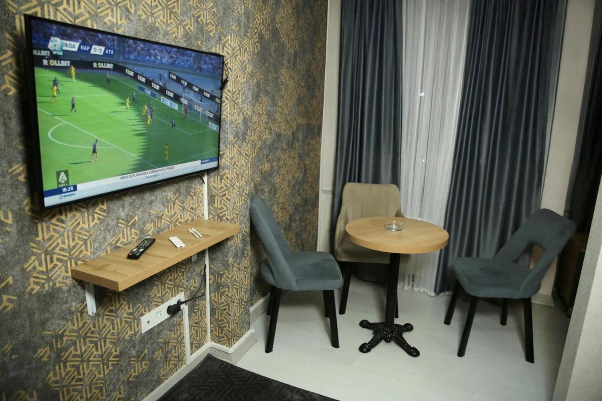 Minimalist Suit Otel - Hizvo