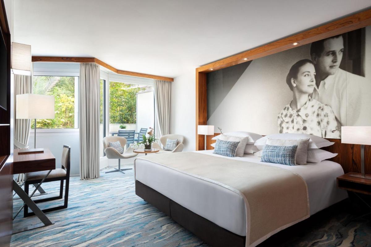 Un ou plusieurs lits dans un hébergement de l'établissement JW Marriott Cannes