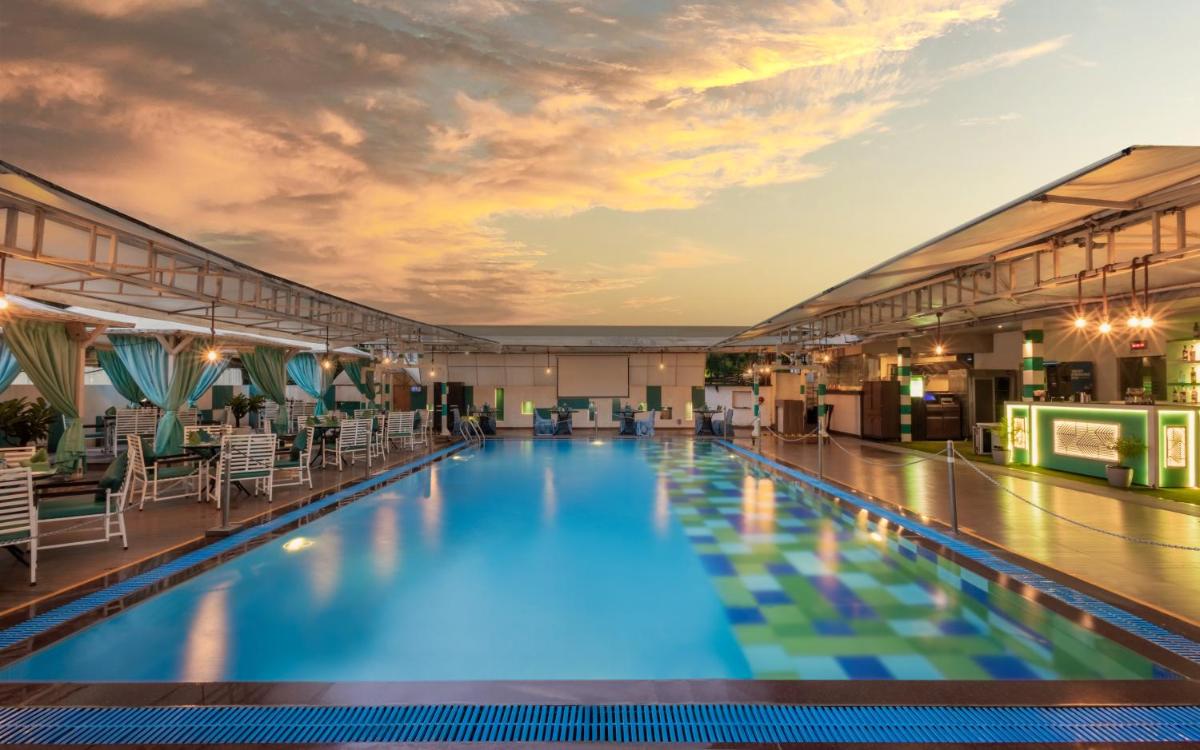 a large swimming pool in a building at Sayaji Pune in Pune