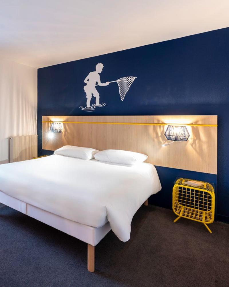 Un ou plusieurs lits dans un hébergement de l'établissement ibis Styles Morlaix