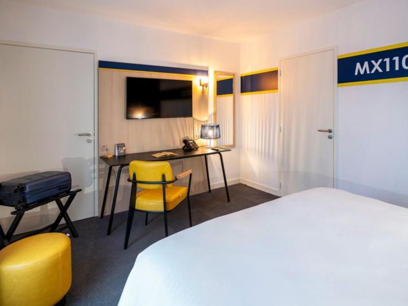 Un ou plusieurs lits dans un hébergement de l'établissement ibis Styles Morlaix