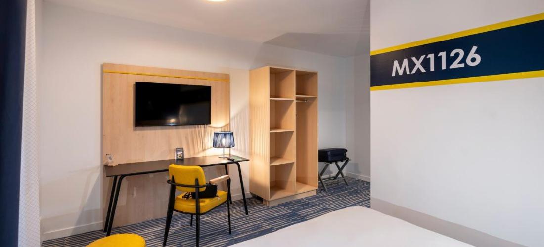 Télévision ou salle de divertissement dans l'établissement ibis Styles Morlaix
