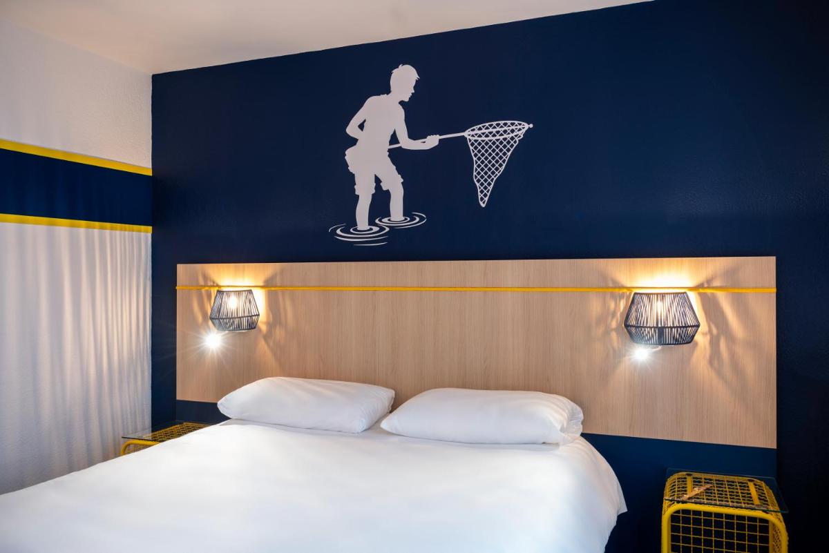 Un ou plusieurs lits dans un hébergement de l'établissement ibis Styles Morlaix