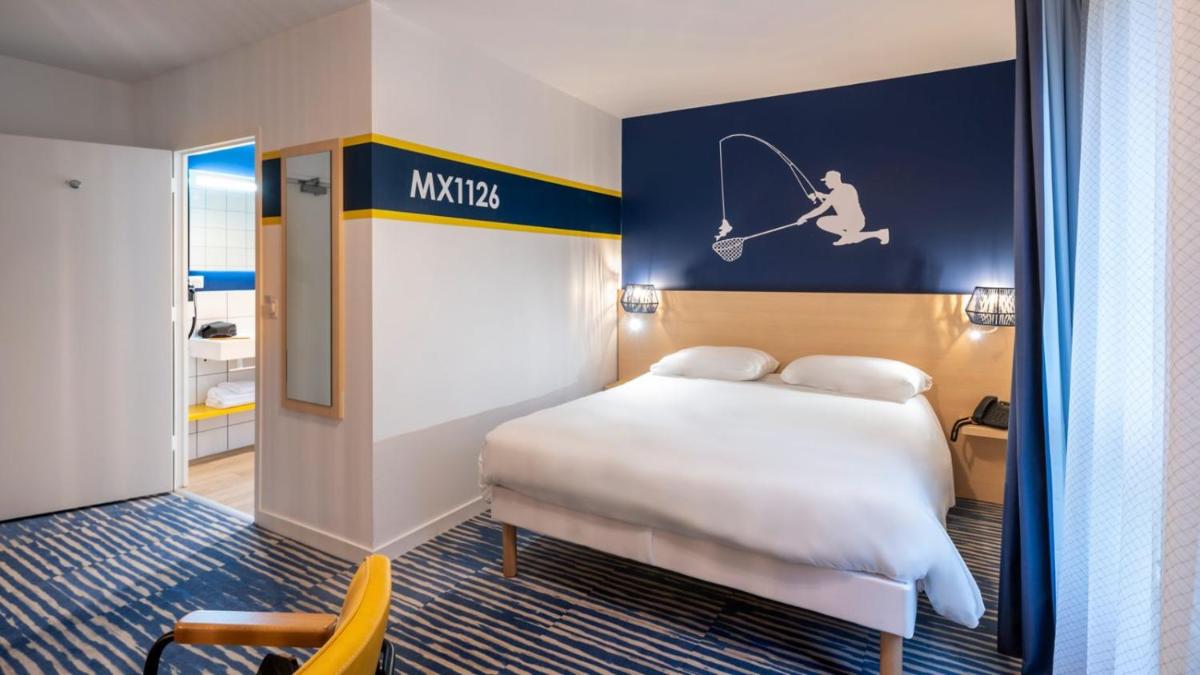 Un ou plusieurs lits dans un hébergement de l'établissement ibis Styles Morlaix