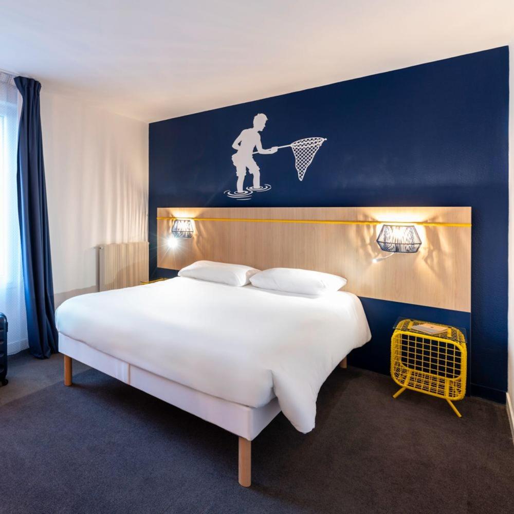 Un ou plusieurs lits dans un hébergement de l'établissement ibis Styles Morlaix
