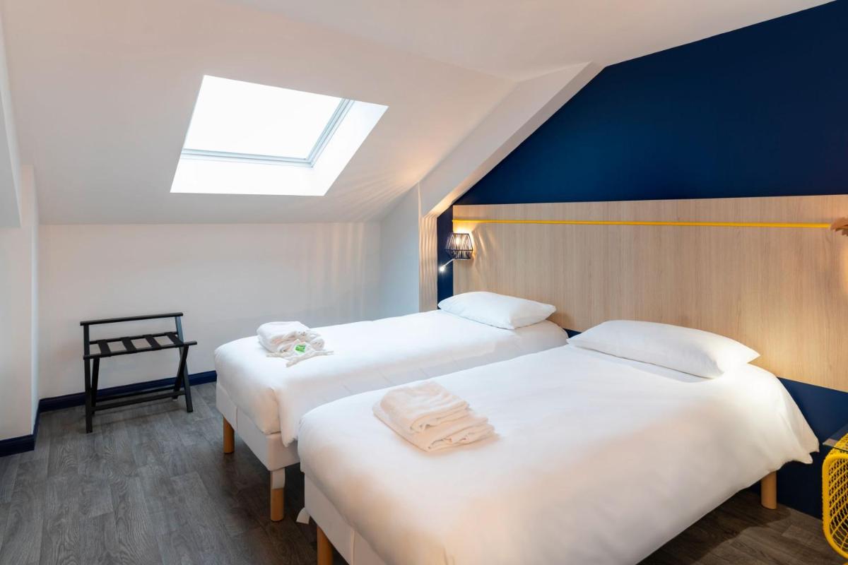Un ou plusieurs lits dans un hébergement de l'établissement ibis Styles Morlaix