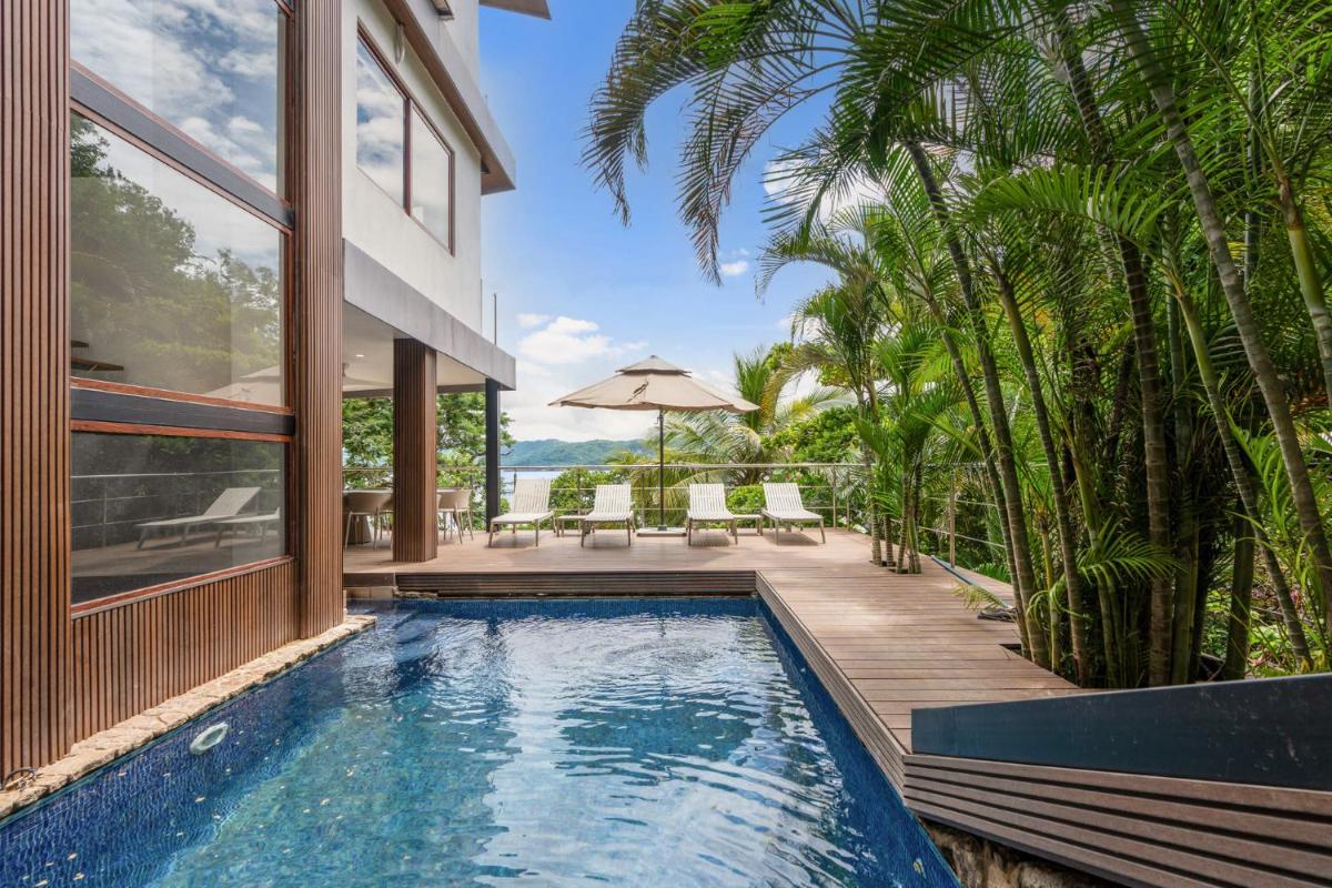 4BD Cliffside Home with Pool on Secluded Beach - Housity