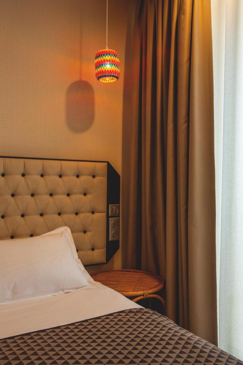 Un ou plusieurs lits dans un hébergement de l'établissement Hotel La Pietra Restaurant & Spa