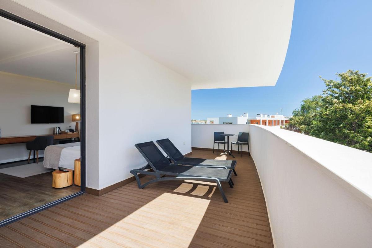 Uma varanda ou terraço em Jupiter Marina Hotel - Couples & Spa