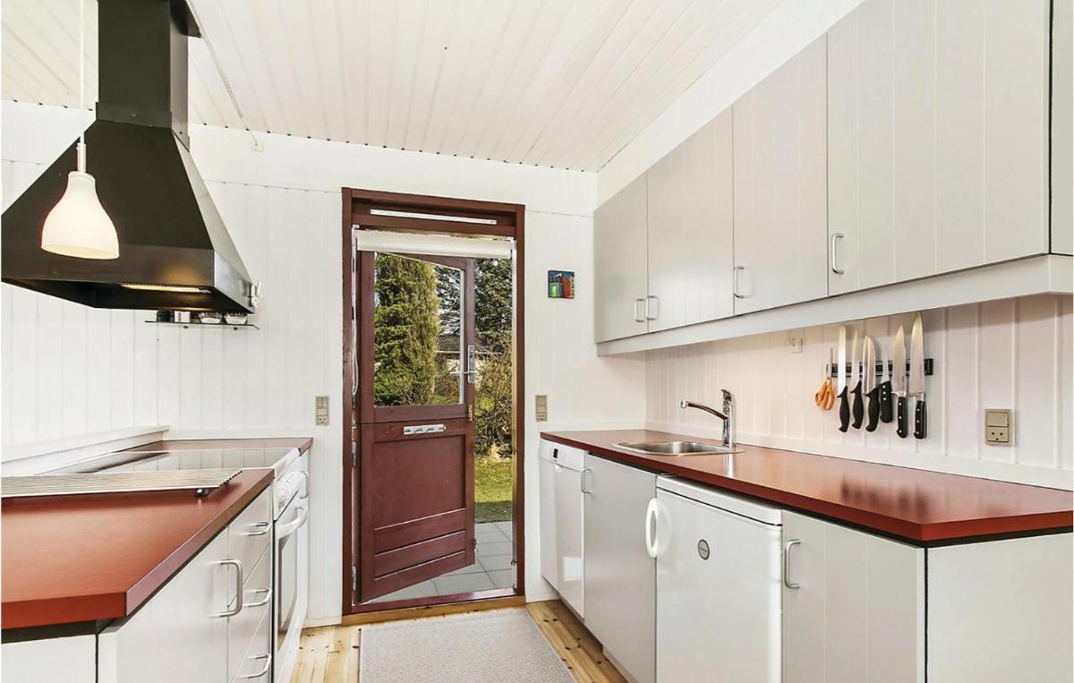 Four-Bedroom Holiday Home In Dronningmolle - Housity