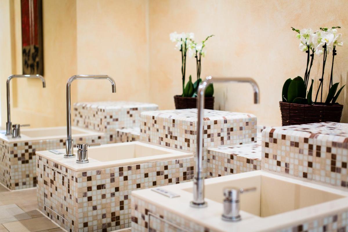 Ein Badezimmer in der Unterkunft Hotel Fährhaus