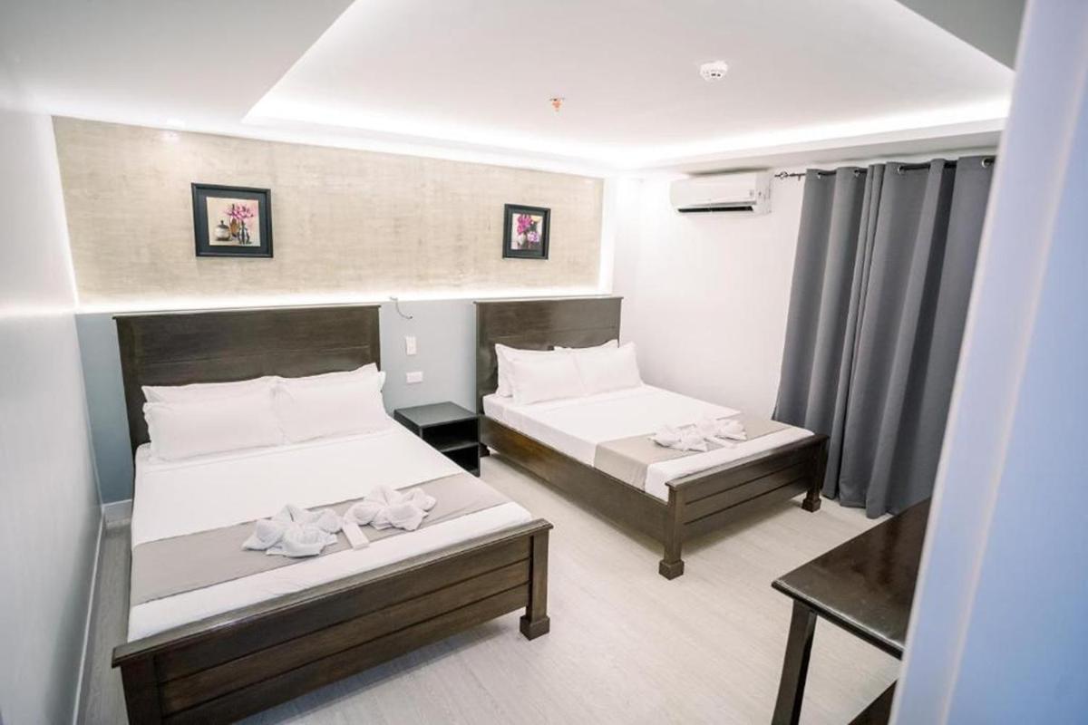 Spotlight Hotel near Hundred Islands Wharf - Housity