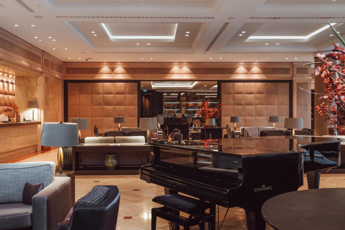 Ein Sitzbereich in der Unterkunft Althoff Seehotel Überfahrt