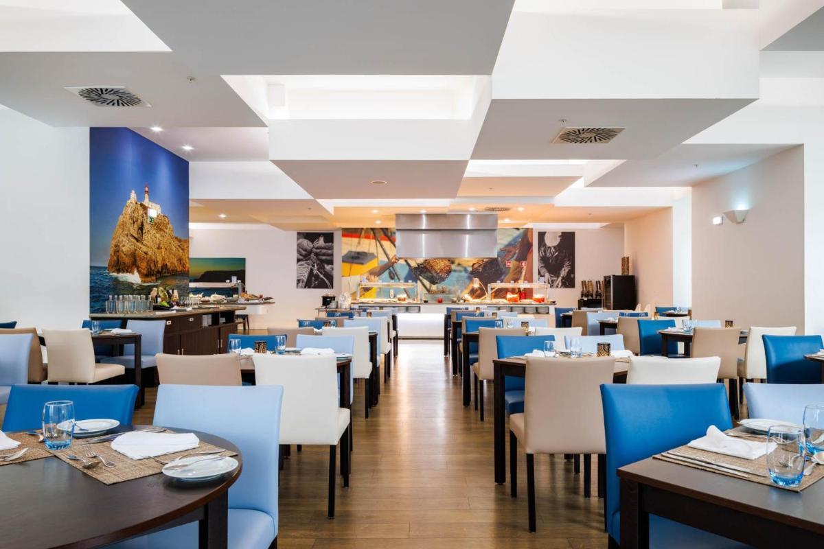 Um restaurante ou outro lugar para comer em Jupiter Lisboa Hotel - Rooftop & Spa