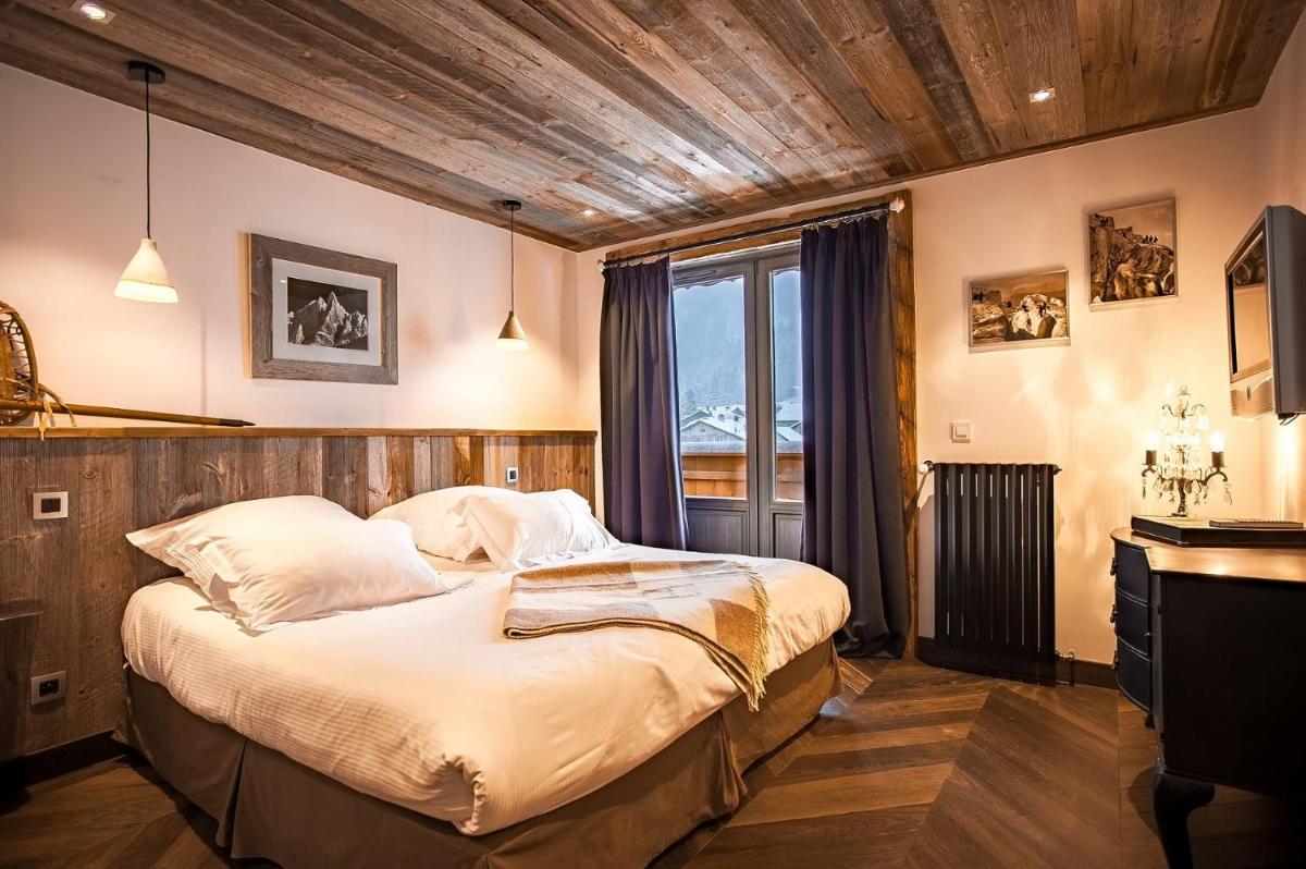 Un ou plusieurs lits dans un hébergement de l'établissement Chalet-Hôtel Hermitage