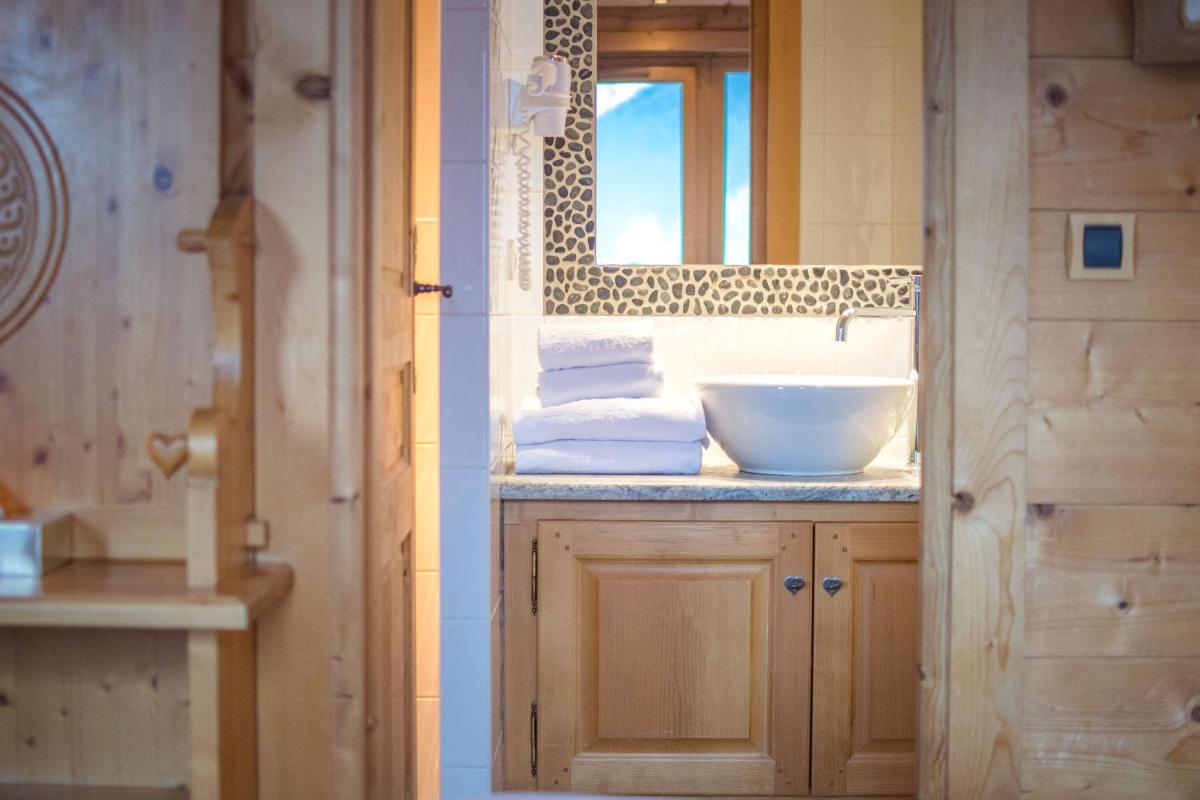 Salle de bains dans l'établissement Chalet-Hôtel Hermitage
