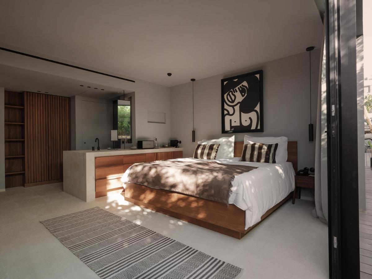 Cama o camas de una habitación en OKU Ibiza