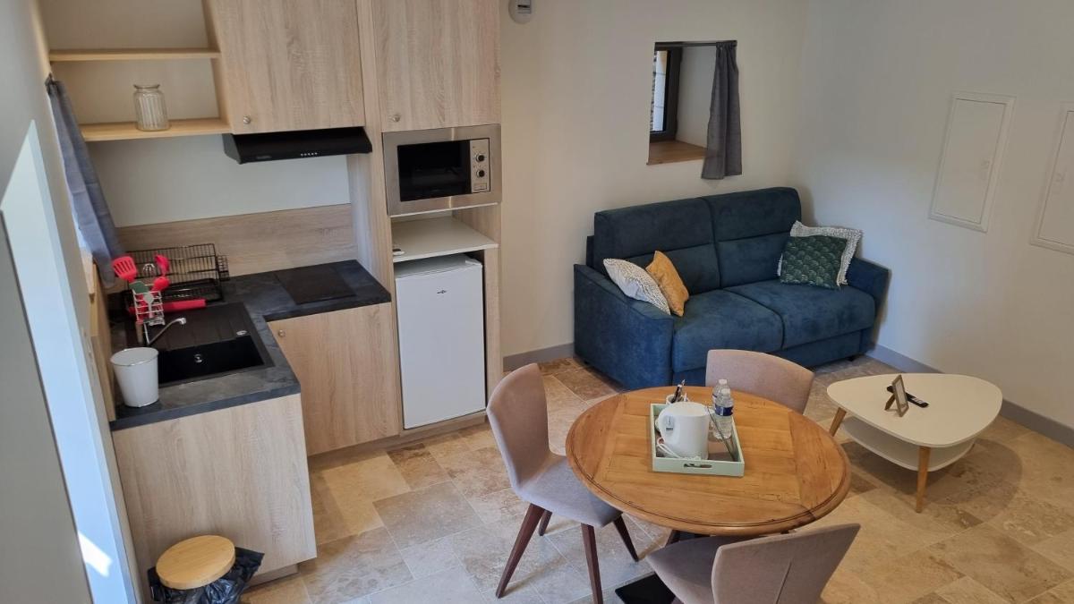 Cuisine ou kitchenette dans l'établissement Logis Hotel Archambeau