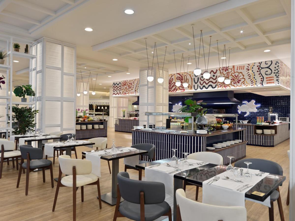 Un restaurante o sitio para comer en H10 Estepona Palace