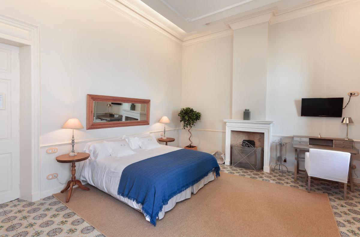 Cama o camas de una habitación en Jardí de Ses Bruixes Boutique Hotel