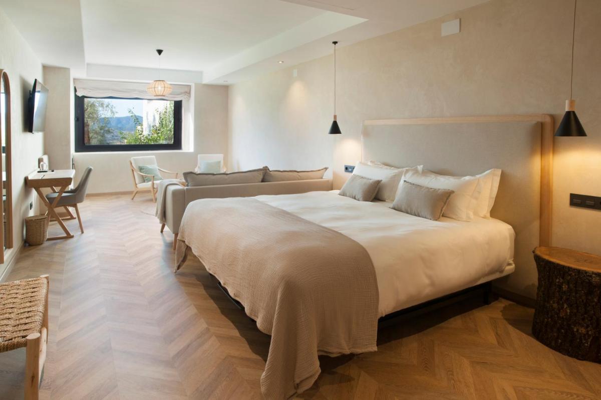 Cama o camas de una habitación en Hábitat Cigüeña Negra