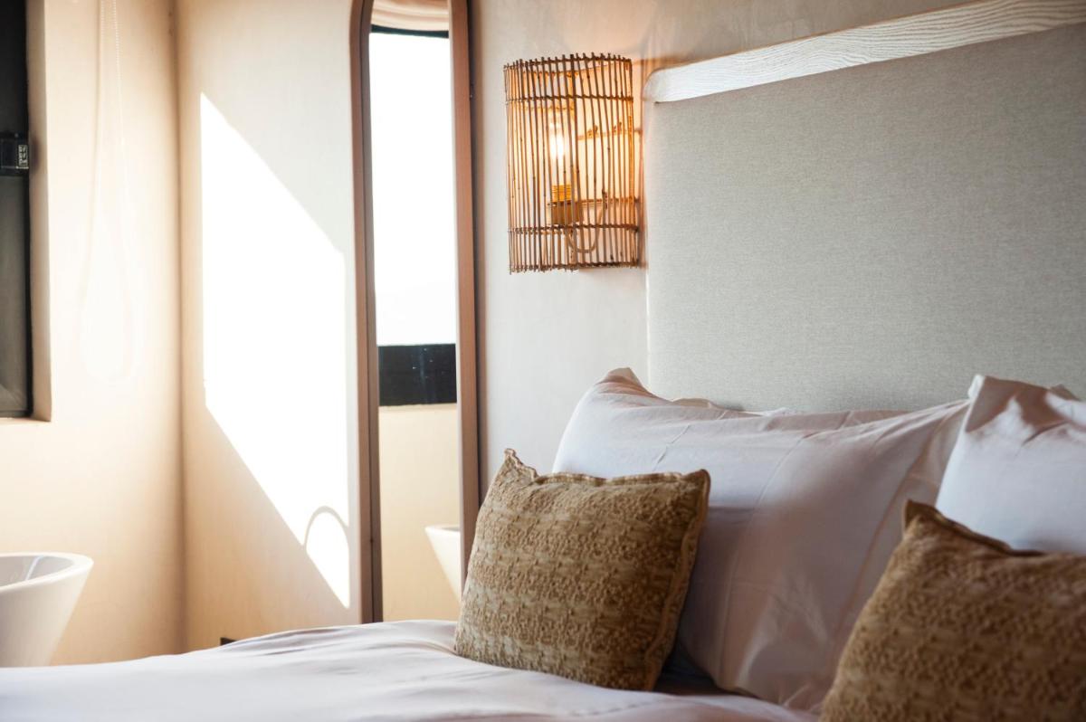 Cama o camas de una habitación en Hábitat Cigüeña Negra