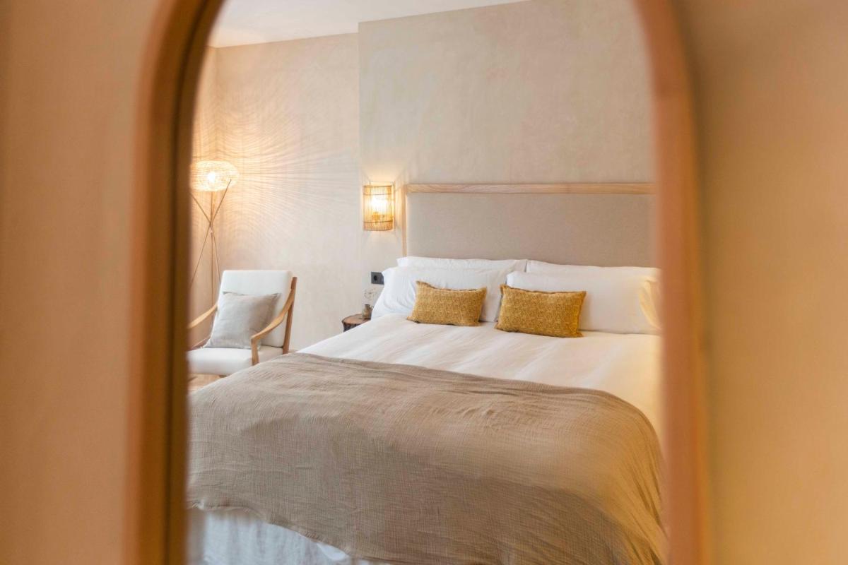 Cama o camas de una habitación en Hábitat Cigüeña Negra