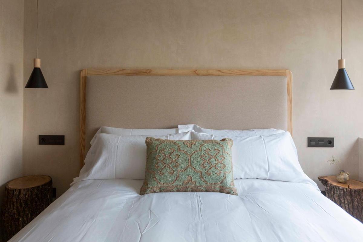 Cama o camas de una habitación en Hábitat Cigüeña Negra