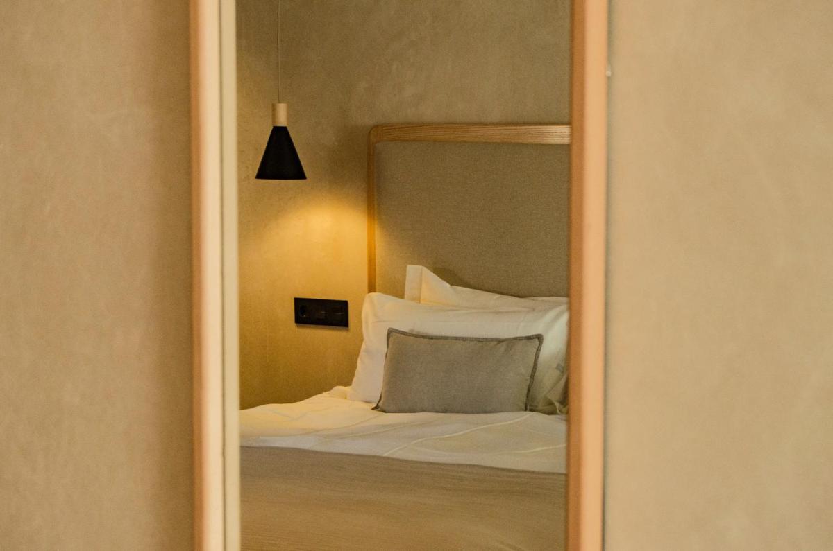 Cama o camas de una habitación en Hábitat Cigüeña Negra