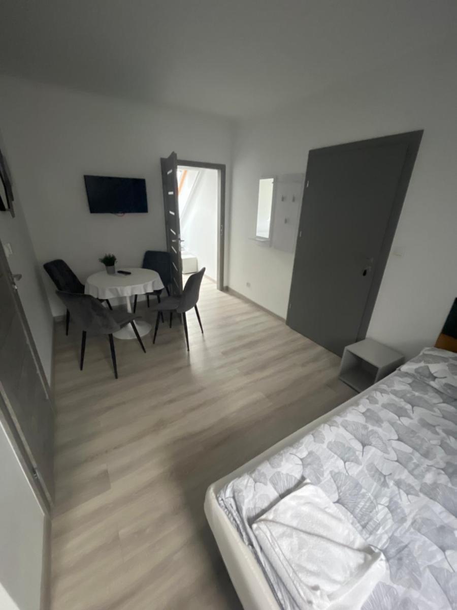 Apartamenty i Pokoje DIMAN - Housity