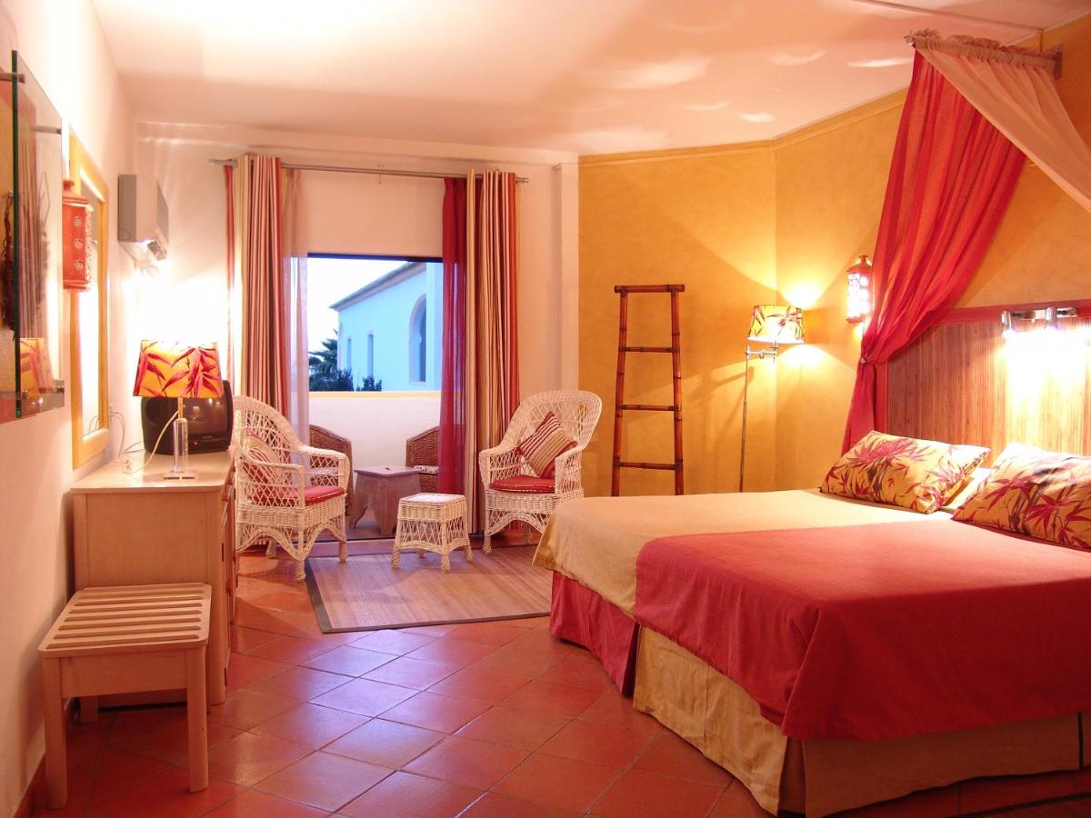 Uma cama ou camas num quarto em Cerro Da Marina Hotel - Adults Only