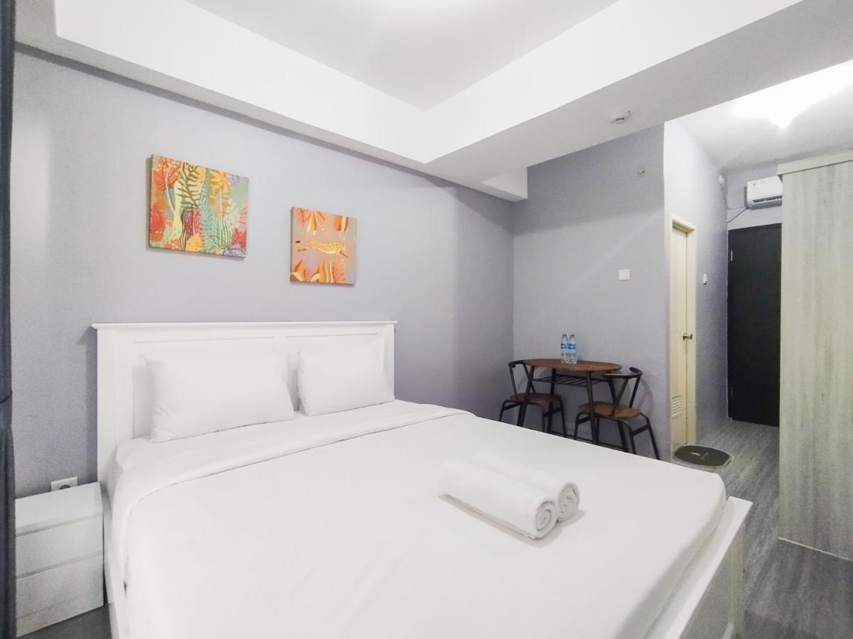 Modern Studio Room Apartment at Grand Asia Afrika By Travelio - Housity