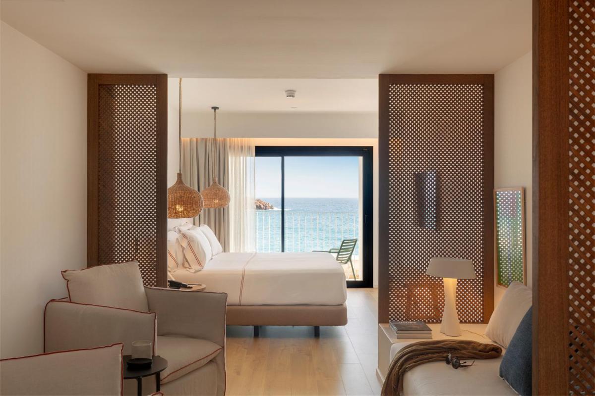 Cama o camas de una habitación en Elisabeth by the Sea Hotel