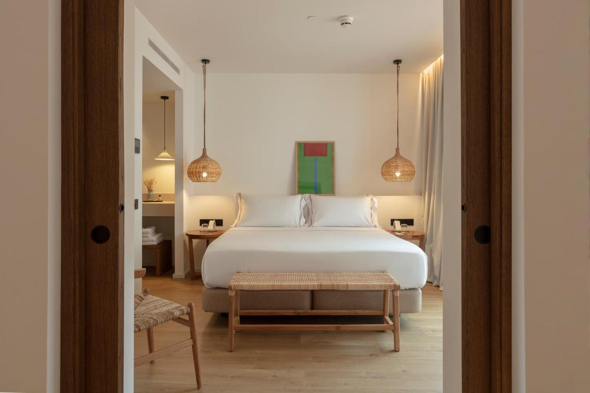 Cama o camas de una habitación en Elisabeth by the Sea Hotel